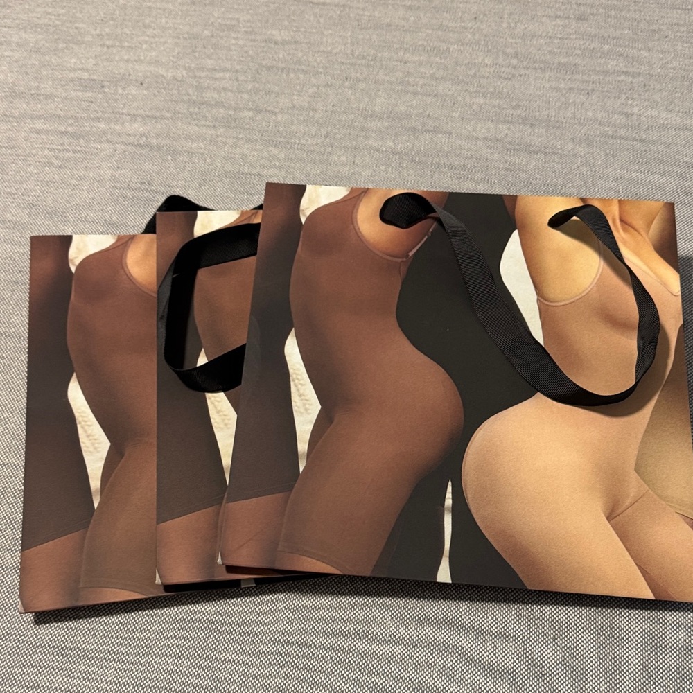 SKIMS Black and Brown empty shopping bags